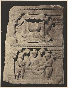Carving of Buddha with two disciples
