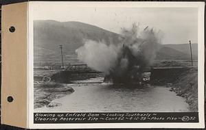 Contract No. 62, Clearing Lower Middle and East Branches, Quabbin Reservoir, Ware, New Salem, Petersham and Hardwick, blowing up Enfield Dam, looking southerly, Enfield, Mass., Apr. 12, 1939
