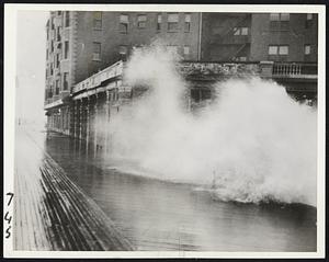 Surf Batters Boardwalk. A high surf is shown as it battered the famous Atlantic City board walk today during the tropical storm.