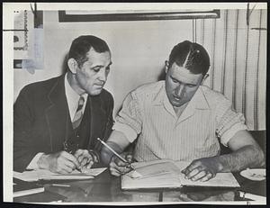 "Throw In The Towel... But Not For Us" reads telegram rejecting coal strike truce mine work sent John L. Lewis by Mike Demchack (left) and Allen Croyle, president and secretary, respectively, of St. Michael's Local 3648, United Mine Workers. The refusal of this Johnstown, Pa., local to accept truce pointed up similar feeling by thousands of soft coal miners.