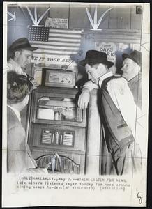 Miner Listen for News. Idle miners listened eager to-day for news around mining camps to-day.