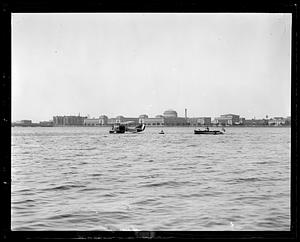 MacMillan airplane on Charles River in front of M.I.T.