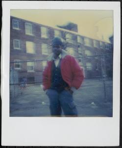 Young man posing in Newtowne Court