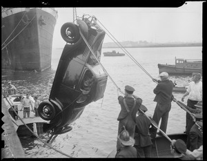 Auto plunges into harbor at army base