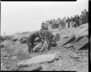 Crowd gathers as police examine evidence