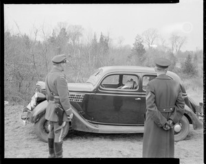 State police guarding murdered man in his car