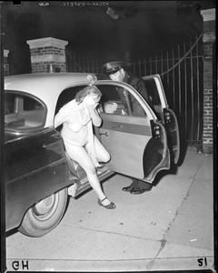 Cops pull nude woman out of car