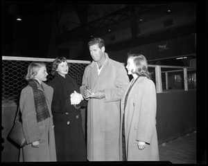 Ted Williams visits young boy and mother in stands - Digital Commonwealth