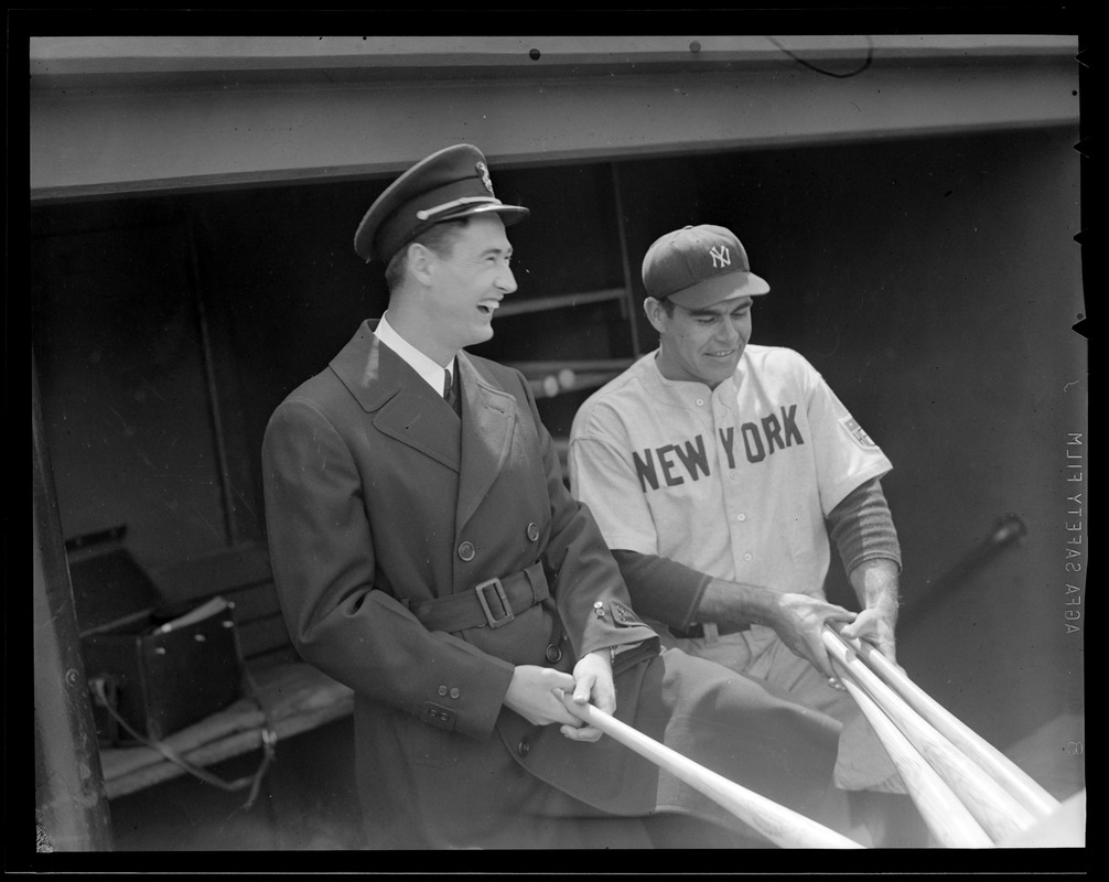 Ted Williams back from service, with Yankee player in Fenway dugout