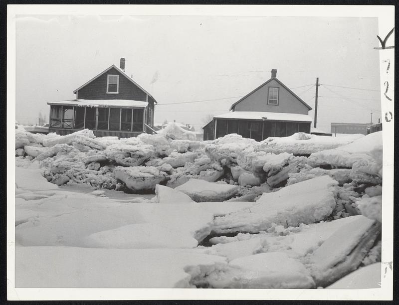 Not a scene in the Arctic regions, but a mid-winter picture just a few miles from Boston which should prove that the weather here has been a bit chilly. This shows the ice-bound Adams shore in Quincy, littered with tons of frozen blocks more than a foot thick.