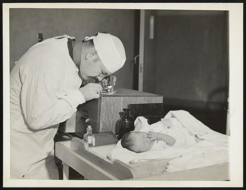 A Pattern in Palms Classification of Palm Prints for Babies Has Been Advocated by Dr. Gilbert P. Pond of West Suburban Hospital, Chicago, Ill., to Prevent Mistakes in Identification. According to Dr. Pond Occurance of Patterns in Six Definate Areas of the Palm Makes Possible a System Suitable for Over 300,000,000 Prints. Photo No. 3 of This Series Shows Dr. Pond Looking at a Palm Print Under a Microscope.