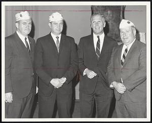 Discussing Plans at City Hall for the state American Legion convention here are from left, William J. Coughlin Jr., parade chairman; Paul A. M. Hunt, convention chairman; Mayor White, and Leo F. Malloy, Massachusetts Department Commander.