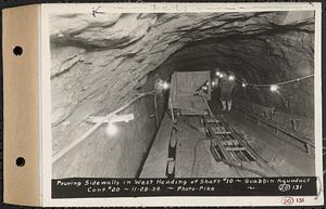 Contract No. 20, Coldbrook-Swift Tunnel, Barre, Hardwick, Greenwich, pouring sidewalls in west heading of Shaft 10, Quabbin Aqueduct, Hardwick, Mass., Nov. 28, 1934