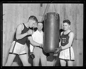 Boxer practicing on a punching bag