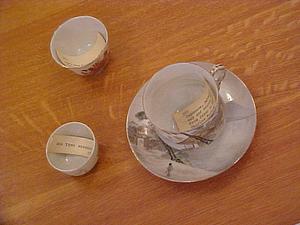 Japanese bone china teacup and saucer, with Japanese gilt decorated sake cup