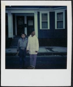Two girls standing in the street