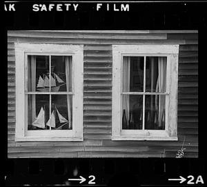 Model sailboats in windows, Monhegan Island, Maine
