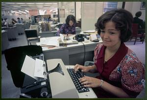 Office scene -- note typewriters and all-female personnel, Cambridge
