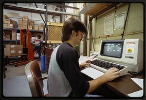 Digital Equipment Corporation computer monitor in use in industrial warehouse, Waltham