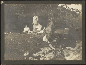 Kunhardt family and friends picnicking by a stream