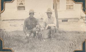 Sergeants Duncan and Carl W. Rommel with dog