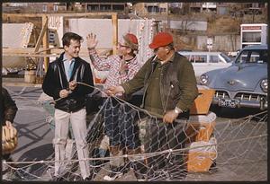 Three men with fishing net