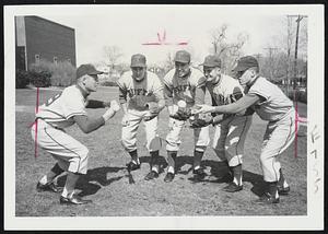 Peppery Lot is this Tufts infield, especially after going over the .500 mark as a result of yersterday's 5-1 triumph over Boston University. Fielding Coach John Coe's pepper shots are-left to right- Wally Rogers of Medway, Dale Grinnel of Winchester, Bob Guidi of Winthrop and Capt. Vandy French of Winchester. The Jumbos are now 5-4.