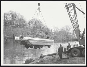 M.D.C. Duck being lowered by crane into Neponset River