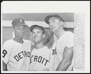 Three-Hit Grin -- Bill Faul, Detroit bonus rookie who hurled a three-hit 5-1 victory over the Washington Senators, poses yesterday in the dressing room with two teammates -- Bill Bruton, left, and Al Kaline. Faul did not give up a hit until the fourth inning and then held the Senators to that one safety until the ninth when he yielded two more hits. Bruton tied a major league record when he doubles in his first four at bats. Kaline drove in three Tiger runs.
