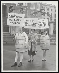 Unparallelled Spending was scantily protested in front of the State House yesterday by William J. Ward of Boston, Mrs. Jean Reed of Waltham and Patti Palmer of Brookline. The broom-sticked, barreled picket line coincided with the state income tax filing deadline and the jump-off the Republican State Committee’s drive for $750,000 in campaign funds.
