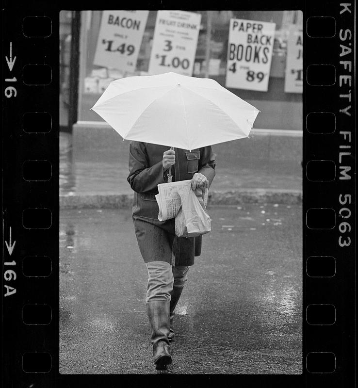 Rainy day walking on State Street, High Street