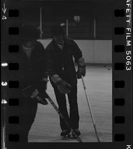 Group playing hockey