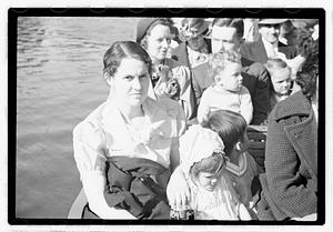 People on a swan boat including Maude Sanromá