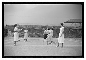 Women playing volleyball
