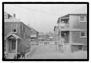 Snow covered street and buildings