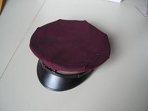 Maroon and black hat