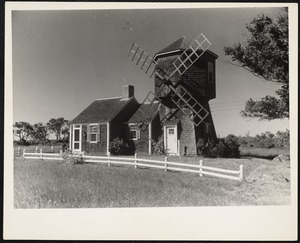 Cape Cod. This old wind mill is now a summer home in Yarmouth, Massachusetts