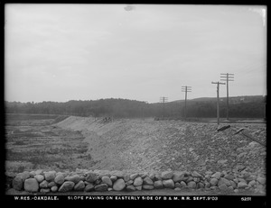 Wachusett Reservoir, slope paving on easterly side of Boston & Maine Railroad, Oakdale, West Boylston, Mass., Sep. 9, 1903