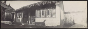 House in Peking, China — Bedroom yard, wicker chair near door