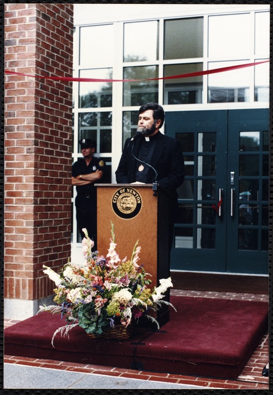 Newton Free Library, 330 Homer St., Newton, MA. Dedication, 9/15/1991. Rev. William Lowe at podium