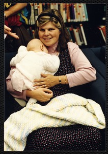 Newton Free Library, 330 Homer St., Newton, MA. Dedication, 9/15/1991. Interior library shots. Mother & child