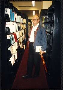 Newton Free Library, 330 Homer St., Newton, MA. Dedication, 9/15/1991. Interior library shots. Man in stacks