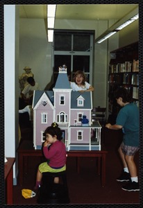 Newton Free Library, 330 Homer St., Newton, MA. Children's Room. Patrons at dollhouse