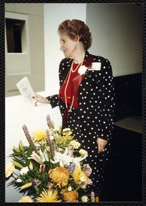 Newton Free Library, 330 Homer St., Newton, MA. 9/14/1991 gala preview, the evening before opening. Woman with flowers