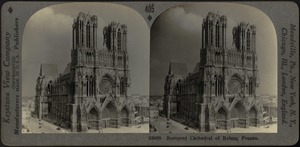 The cathedral of Reims, and street restored since the world war, France