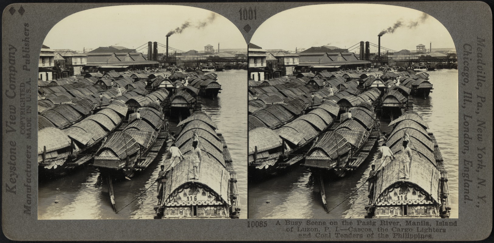 Filipino cascoes, or freight boats, on the river front of Manila, P.I.