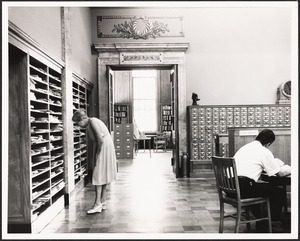 Public Library, interior view. Reading room looking into ref. room