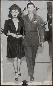 Cpl. and Mrs. John Deveny in Los Angeles court