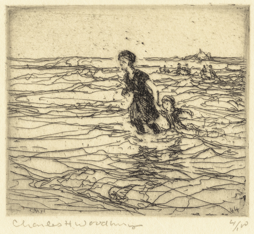 Woman and child in the surf