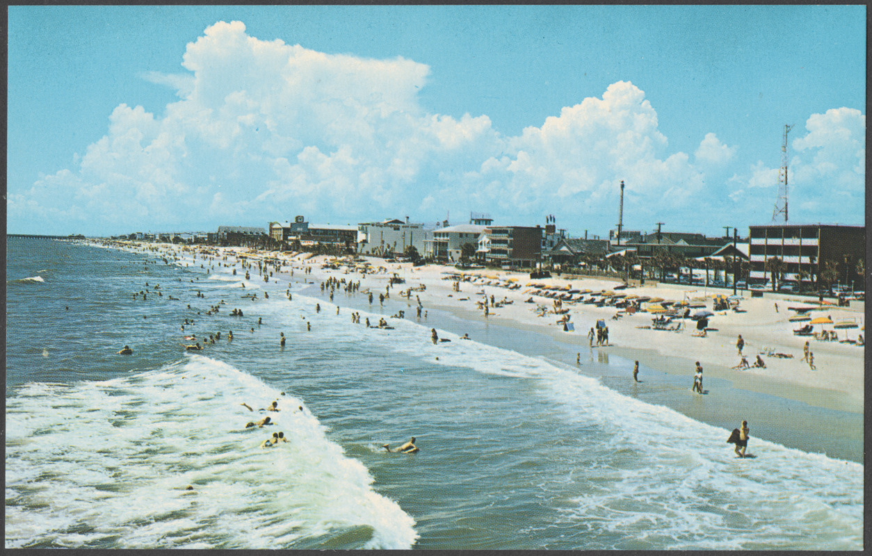 Warm surf beckons to the many vacationers enjoying the modern beachfront motels in beautiful Myrtle Beach, S. C.